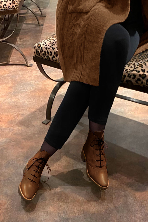 Caramel brown women's ankle boots with laces at the front. Round toe. Low rubber soles. Worn view - Florence KOOIJMAN